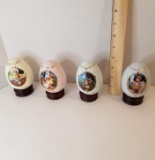 Lot of 4 M.J. Hummel Porcelain Egg Figurines on Wooden Bases