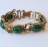 Pretty Gold Tone Bracelet with Green Stones