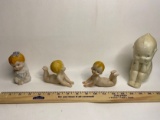 Lot of 4 Porcelain Display Baby Figures