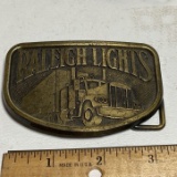 Brass “Raleigh Lights” Advertisement Belt Buckle with Tractor Trailer Truck