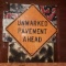 Vintage Reflective Road Sign “Unmarked Pavement Ahead”