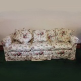 Floral Sofa with Wooden Legs