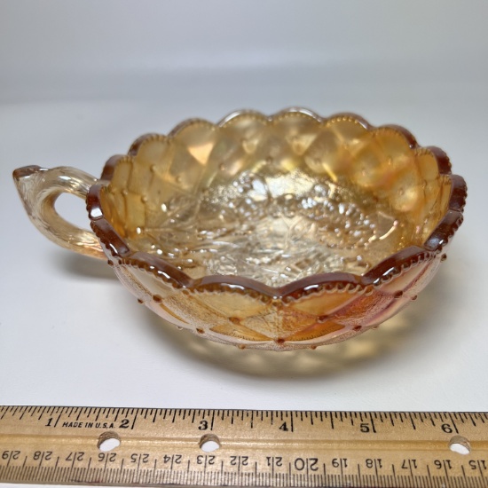 Imperial Carnival Amber Glass Single Handle Nappy bowl with Embossed Pansy Pattern