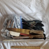 Container Full of Catering Utensils