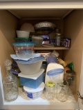 Cabinet Lot of Plasticware, Glass Jars, and More