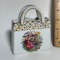 Herman Dodge & Son, Inc Porcelain Bag with Open Lattice & Floral Design
