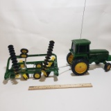 Plastic RC John Deere Tractor and Metal Hares