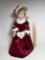Beautiful 1999 Christmas Porcelain Doll on Stand