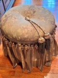 Upholstered Tuffet with Hanging Tassels