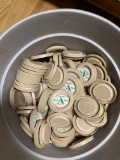 Plastic Pail Filled with Paper Milk Bottle Caps