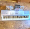 Yamaha Keyboard with Lessons Set and Music Stand