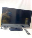 LG Flat Screen TV on Base with Remote - Works