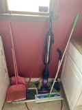 Corner Lot of Floor Cleaning Items - Broom, Vacuum, Duster