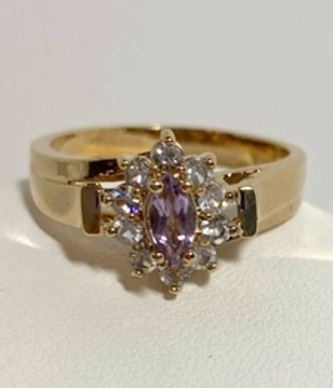 Pretty Gold Tone Ring with Purple Stone