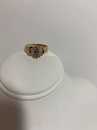Pretty Faux Ring with Purple Stone