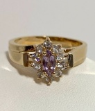 Pretty Gold Tone Ring with Purple Stone