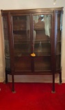 Antique Mahogany China Cabinet with Curved Glass on Casters