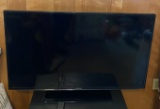 Samsung TV on Stand with Remote