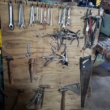 Board Filled with Assorted Tools