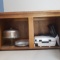 Contents of Cabinet Over Refrigerator - Griddle, Cake Plate