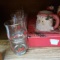 Cabinet Lot of Assorted Christmas Items - Chargers, Glasses, Platters and More