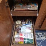 Contents of Cabinet Beside Refrigerator - Paper Goods and More