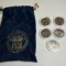 Lot of State Quarters in Plastic Cases with “World Reserve Monetary Exchange” Drawstring Bag