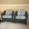 Pair of Dark Green Wicker Rocking Chairs with Striped Fabric Thick Seat Cushions