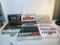 Lot of Plastic and Cardboard Dealership License Plate Covers