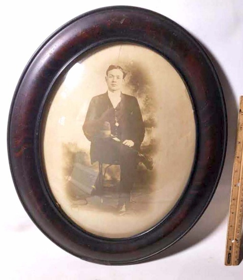Antique Oval Wood Frame with Bubble Glass