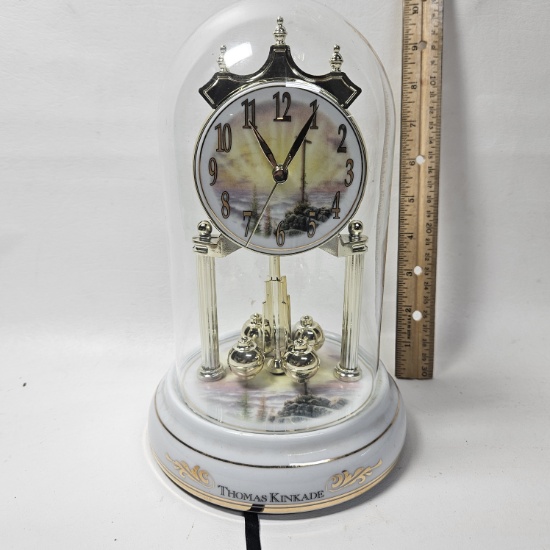 Thomas Kinkade Clock  (Clock works but music doesn’t. Battery cover missing)
