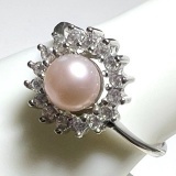 Sterling Silver Ring with Pink Pearl Center Surrounded by Clear Stones