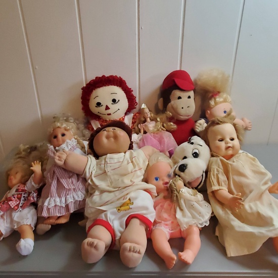 Lot of Dolls Including 2 Cabbage Patch, Curious George, and Homemade Raggedy Ann