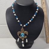 Gold Tone Fleur De Lis Necklace with Blue Stones and Pearls