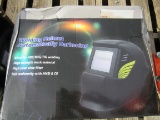 NEW & UNUSED AUTO DARKENING WELDING HELMET