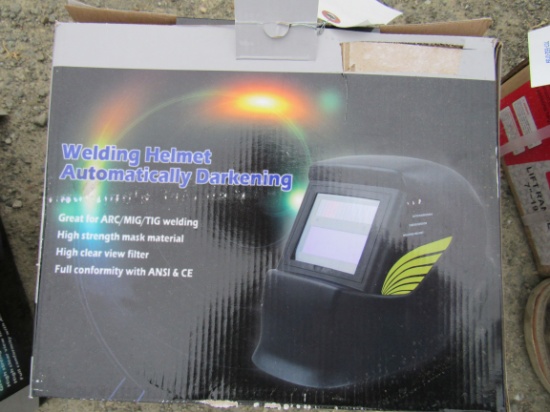 NEW & UNUSED AUTO DARK WELDING HELMET