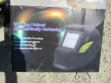 NEW & UNUSED AUTO DARKENING WELDING HELMET