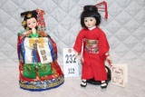 2 Oriental dolls