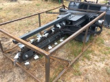 (243)SKID STEER TRENCHER