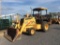 (64)JD 310E BACKHOE