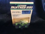 4 - 1/64 TOY TRACTORS W/ STUFFED TOY