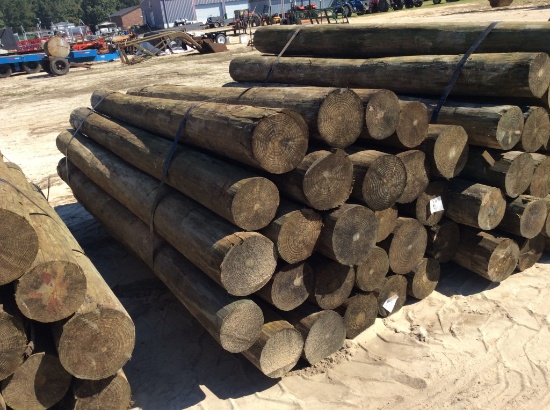 (256)BUNDLE OF 25 - 7" X 8' ROUND WOOD POST