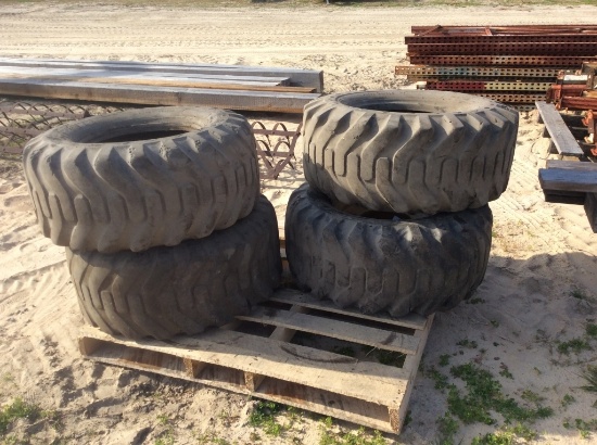 (2)SKID STEER TIRES (2 WITH RIMS)