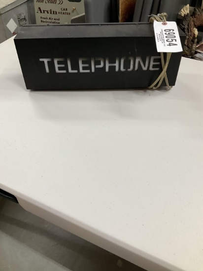 TELEPHONE LIGHTED ADVERTISEMENT