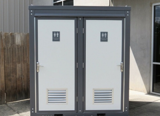 (703)UNUSED BASTONE PORTABLE 2 STALL TOILET