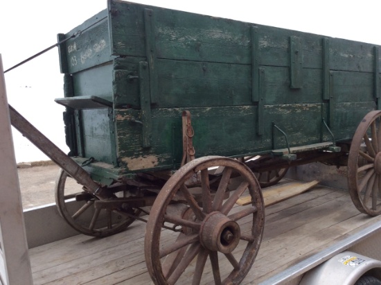 Old horse-drawn triple box wagon