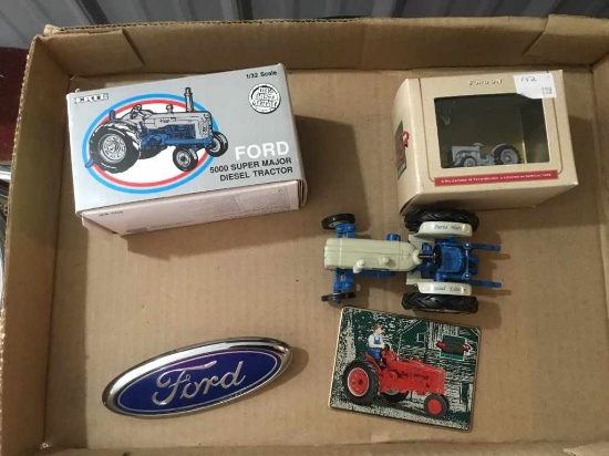 Box of miscellaneous Ford items