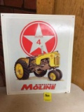 MM tin sign with 4-Star Super tractor on it