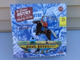 Gene Autry wind-up tin toy