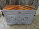 Rustic Buffet with reclaimed wood top and barn tin sides.